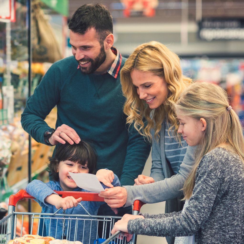 A family shopping together in a supermarket during the Tax Free Weekend in Dallas Fort Worth.