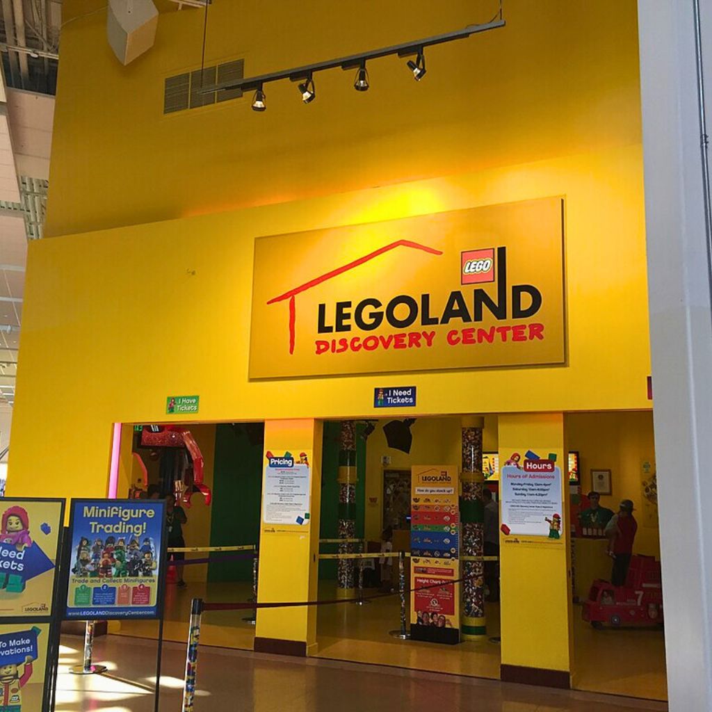 Colorful entrance to Legoland, featuring Lego structures and family-friendly attractions for kids in Dallas this August.